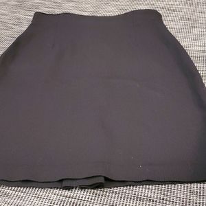 Cline-Kolarek Black Skirt w back slit   6.    E